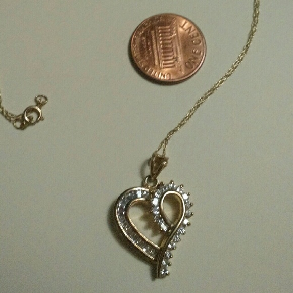 Gold heart necklace with clear gems