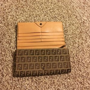 Authentic Fendi Satchel Bag with matching wallet.