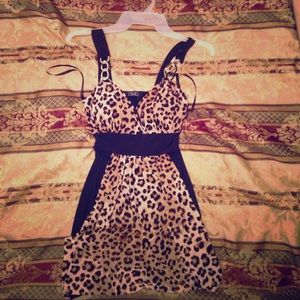 A leopard shirt from Deb, size small.