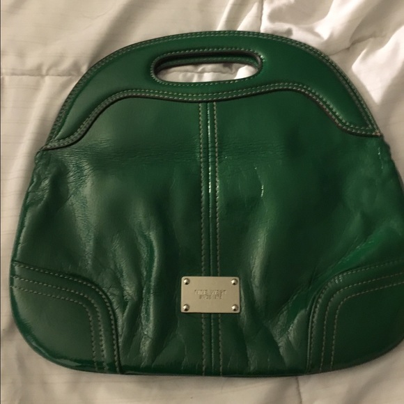 Nine West fold over magnetic clutch