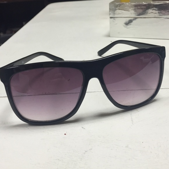 Purple tinted sun glasses