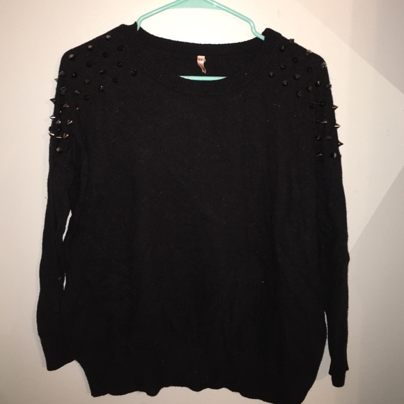 Black shoulder-studded sweater
