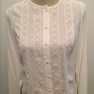 Designer woman's floral front cream colored blouse