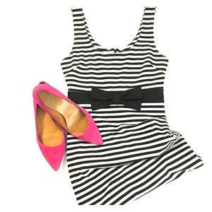 Stripped dress with bow detail