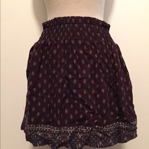 Designer woman's maroon print skater skirt