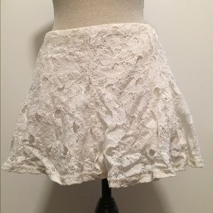 Designer white lace mini skirt