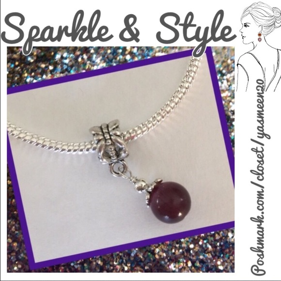 Dark purple cat's eye charm