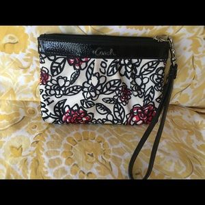 Coach vinyl printed wristlet, used, in great shape