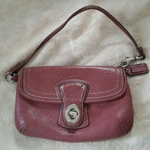 Coach wrislet mauve leather  7 1/2 x 4 3/4