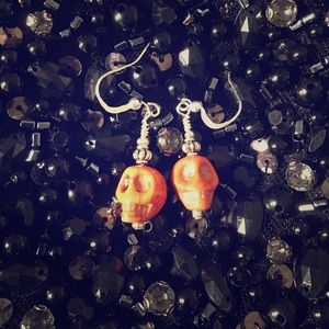 Handmade skull earrings.