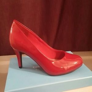 Cherry red patent leather pumps
