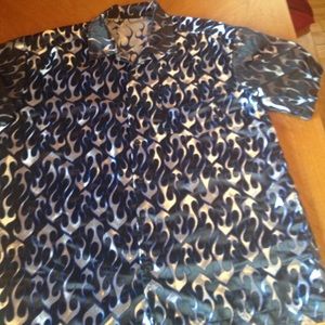 Black and blue short sleeve button up shirt.