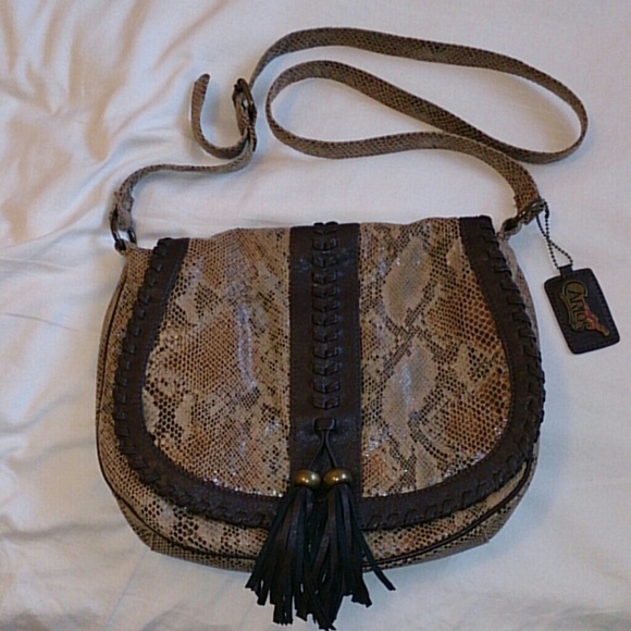 Carlos Santana purse