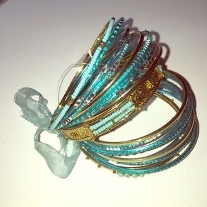 NEW Charming Charlie's set of 20 bracelets
