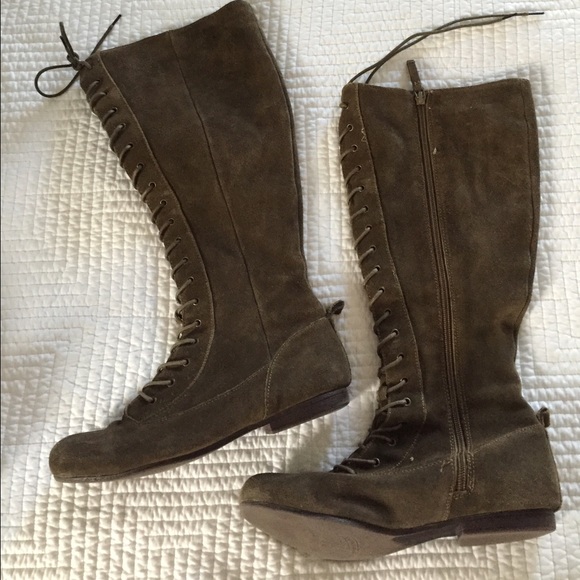 Green suede lace up knee high boots.