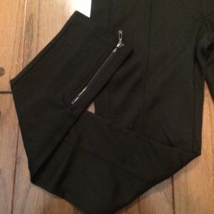black leggings with zipper details