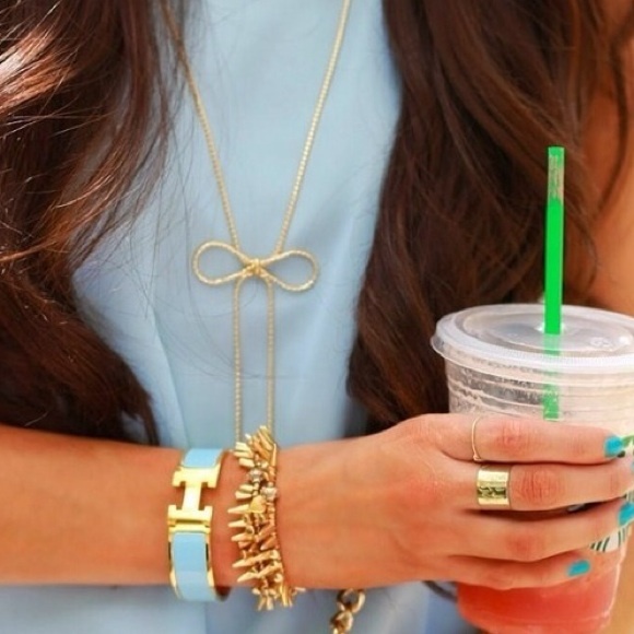 Boutique Jewelry - NWT Long Bow Necklace -SILVER