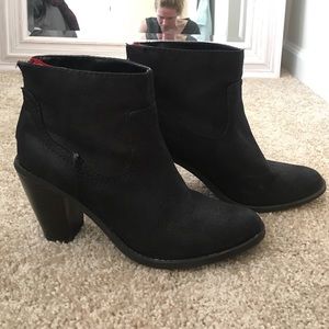 Black ankle booties with red zipper!