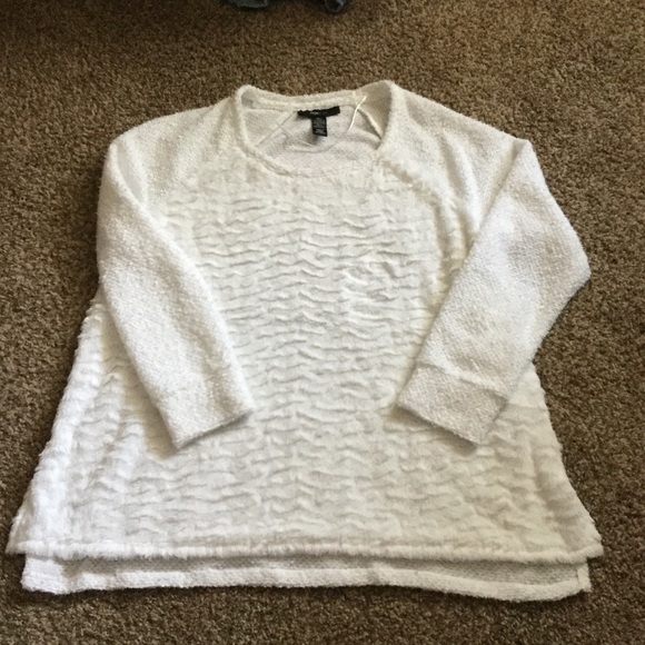 Soft white fuzzy sweater. Light weight