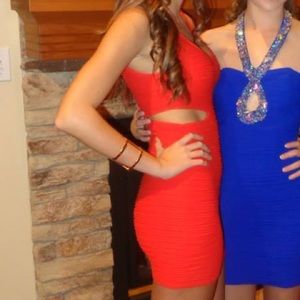 Red bebe dress with cutouts. Worn once