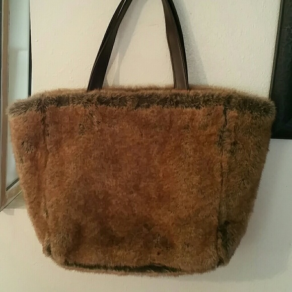 Faux hair on fuzzy bag