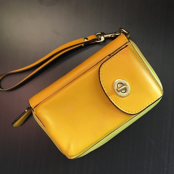 Coach leather yellow wristlet/wallet.