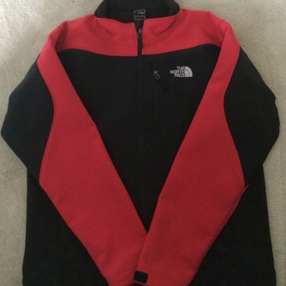 Hard shell black and red northface jacket.