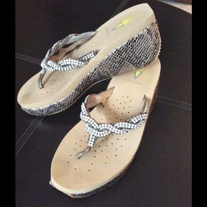 Volatile Wedge Flip Flops