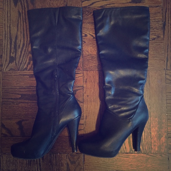 Tall black pleather boots