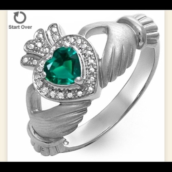 Brand new Claddagh ring with emerald stone