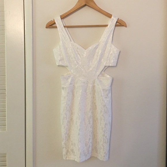 Brand new L'ATISTE cut out dress with tag.