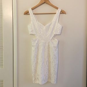 Brand new L'ATISTE cut out dress with tag.