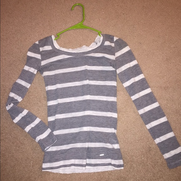 Long sleeve top. White and grey striped.