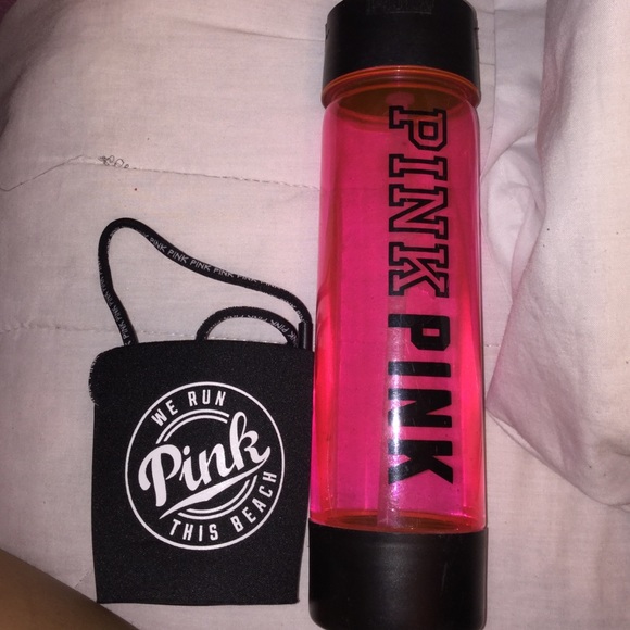 Pink koozie holder and bottle