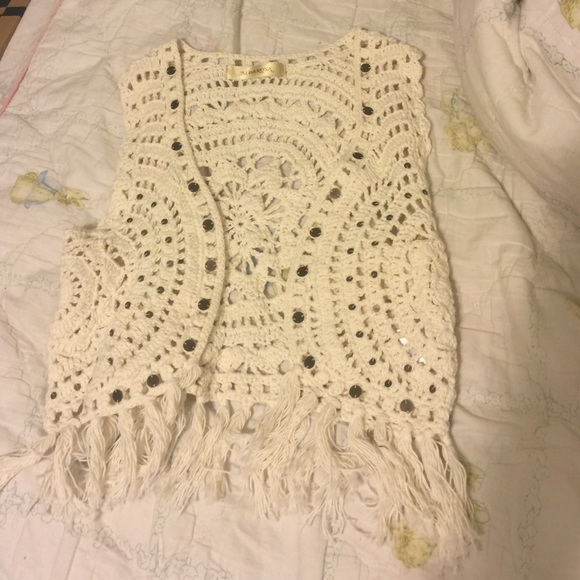 Boho style embellished vest.