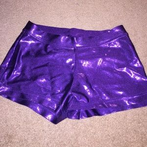 Purple shimmering booty shorts