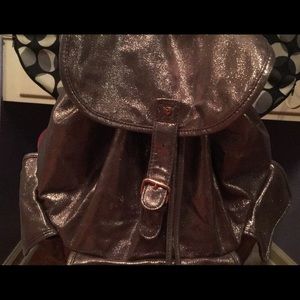 drawstring metallic backpack