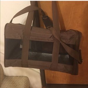 Sherpa deluxe pet carrier.