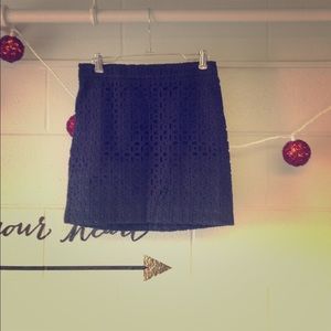 Navy blue miniskirt with patterned cut out design
