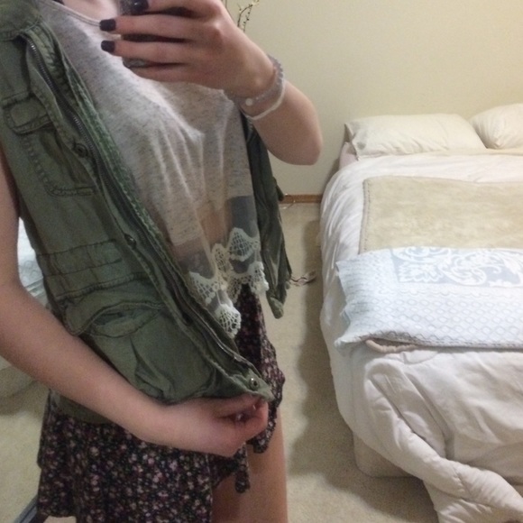 a green army vest