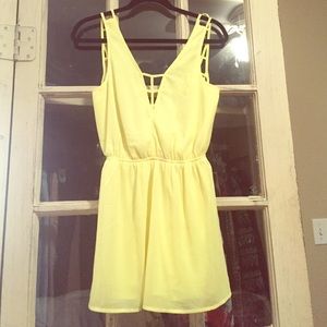 Neon yellow romper with strapped back!