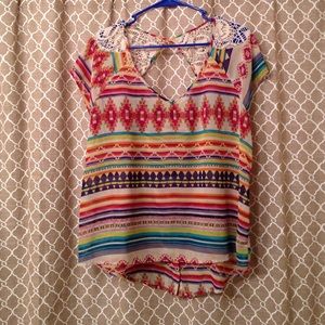 Colorful sheer top with cut out and button up back