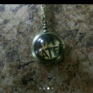 Alice in wonderland necklace