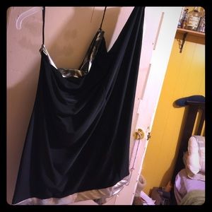 A black and silver one shoulder party dress