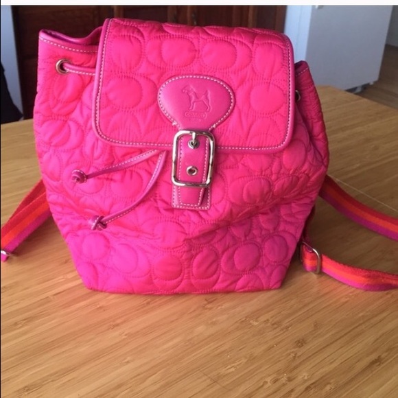 Matching coach dog coat and backpack