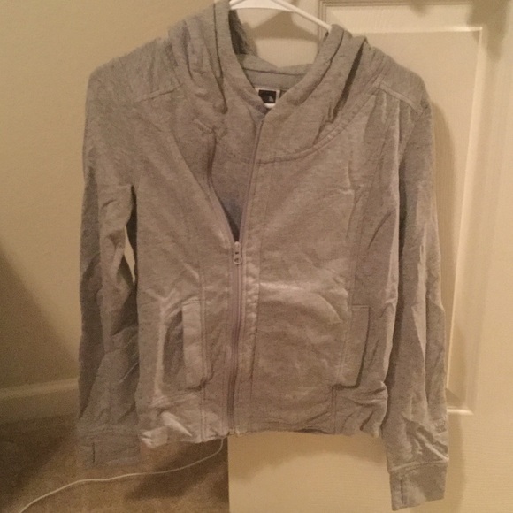 Small light gray North Face zip up cross front