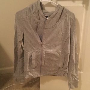 Small light gray North Face zip up cross front