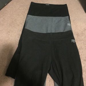 Three pairs of gym pants.
