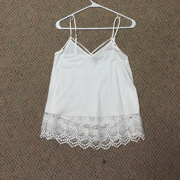 Tank top with lace hem.