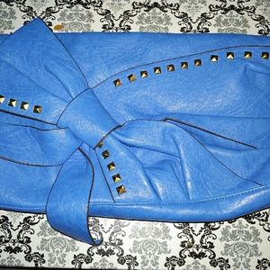 Oversized blue bow clutch